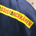 Annandagsbandy med Assistancekårens logo på tröjan